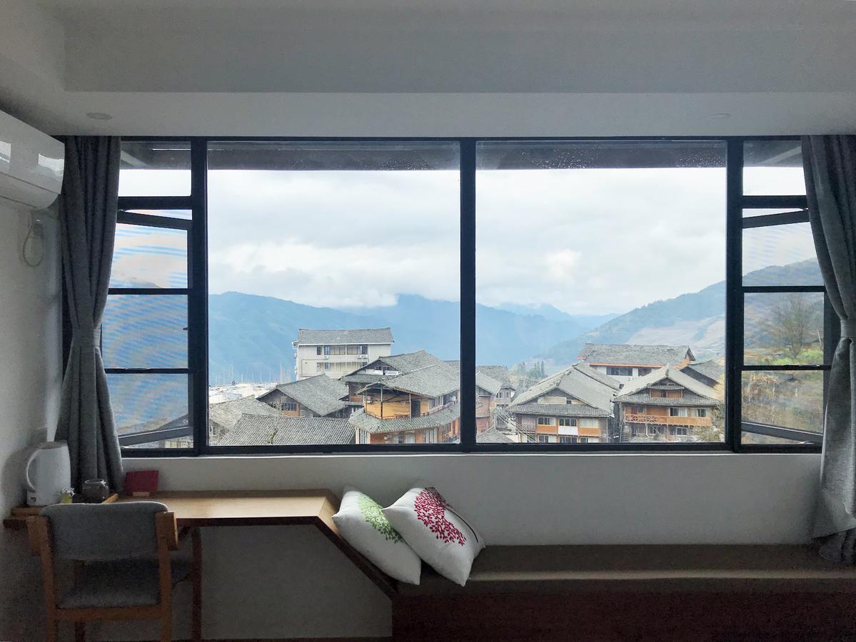 Travelling With Hotel Long Ji Ping An Longsheng Exterior photo